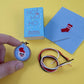 Christmas Baubles Ho Ho Ho Cross Stitch Kit In A Matchbox